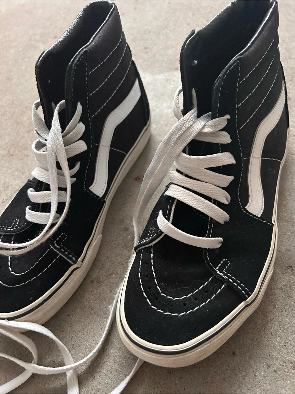 Vans Black and White High-Top Skate Sneakers - Classic Street Style